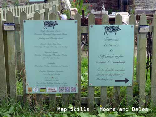 Signs at entrance gate